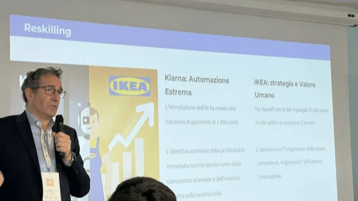 Giovanni Giamminola presenting a slide on reskilling